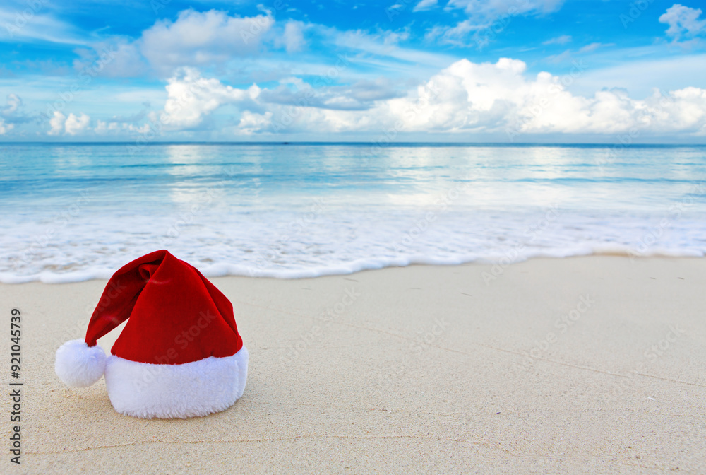 Merry Christmas with Santa hat on the tropical beach Merry Christmas with Santa hat on the tropical beach