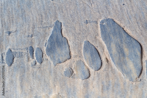 old torn cloth with holes, torn cloth with many holes