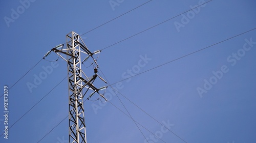 Bilde på lerret low voltage electric metal tower against the sky
