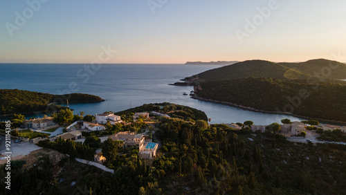 Aerial view of expensive residential houses in island small town Syvota Greece. American dream homes as example of real estate development in US suburbs