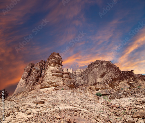 Mountains of Wadi Rum Desert also known as The Valley of the Moon is a valley cut into the sandstone and granite rock in southern Jordan 60 km to the east of Aqaba