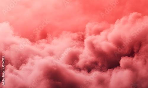 A red cloud filled sky with a pinkish hue photo