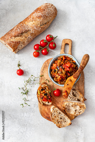 bruschetta with caviar with eggplants, tomatoes, peppers and onions