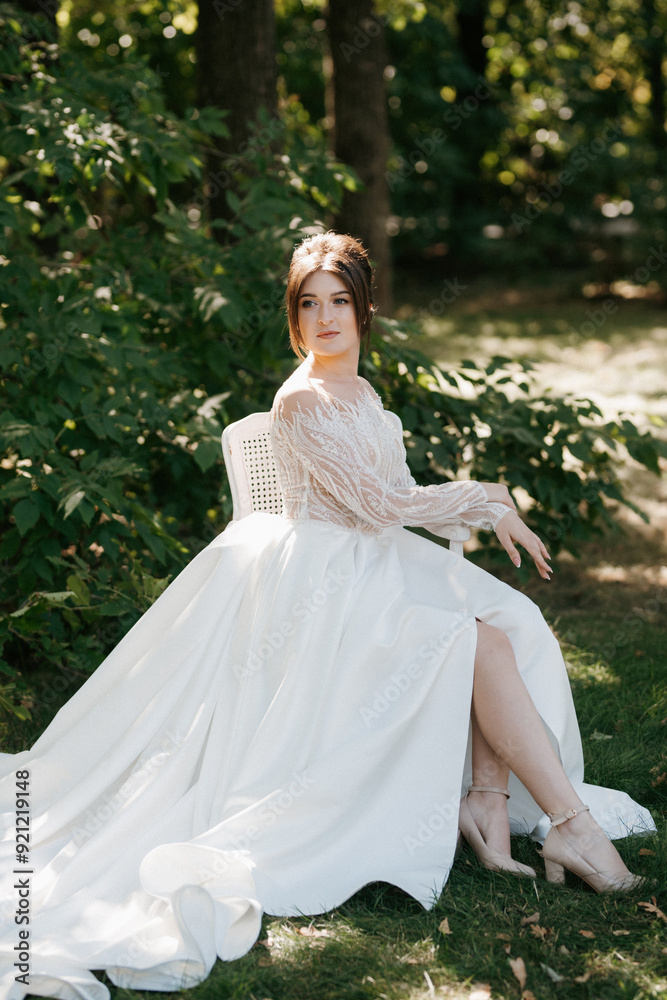 Fototapeta premium young girl bride in spring garden