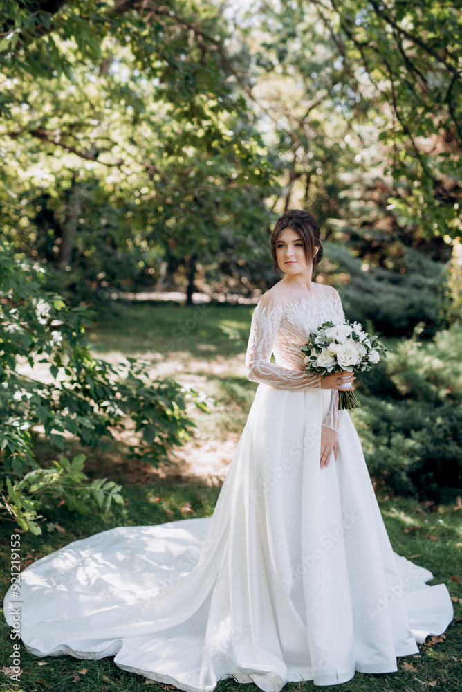 young girl bride in spring garden