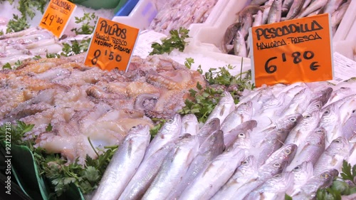 A large selection of seafood on the counters of the world-famous Olivar market in Palma de Mallorca, Spain. A variety of fresh fish, octopus, shellfish and crustaceans