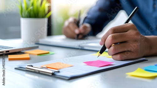  A vibrant social media campaign brainstorming session, with colorful post-it notes, laptops, and a diverse team sharing creative ideas