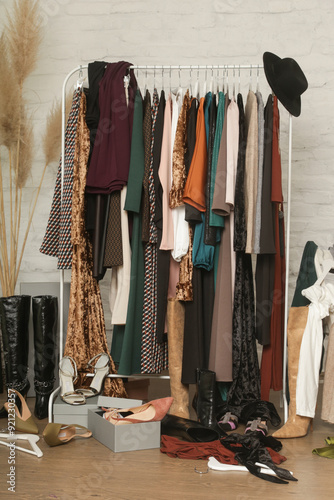 Εκτύπωση καμβά Untidy cluttered woman wardrobe with stylish clothes and accessories