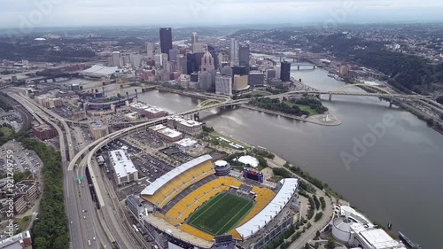 Aerial View of Pittsburgh, Pennsylvania and Heinz Football Stadium in Foreground. Three Rivers and Bridges Are Visible photo