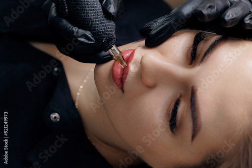 Process permanent tattoo red pigment makeup for lip of woman