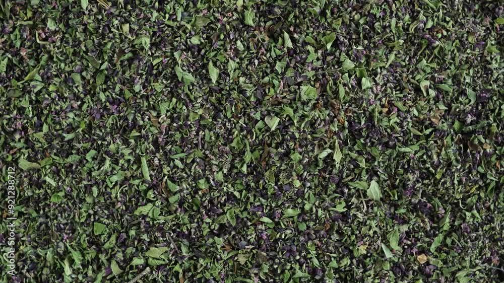 Dried Origanum vulgare or Oregano, close-up. Fragrant spicy seasoning is used in cooking, alternative medicine and as an additive in herbal tea. 4K Video, rotating. Dried Origanum vulgare or Oregano, close-up. Fragrant spicy seasoning is used in cooking, alternative medicine and as an additive in herbal tea. 4K Video, rotating.