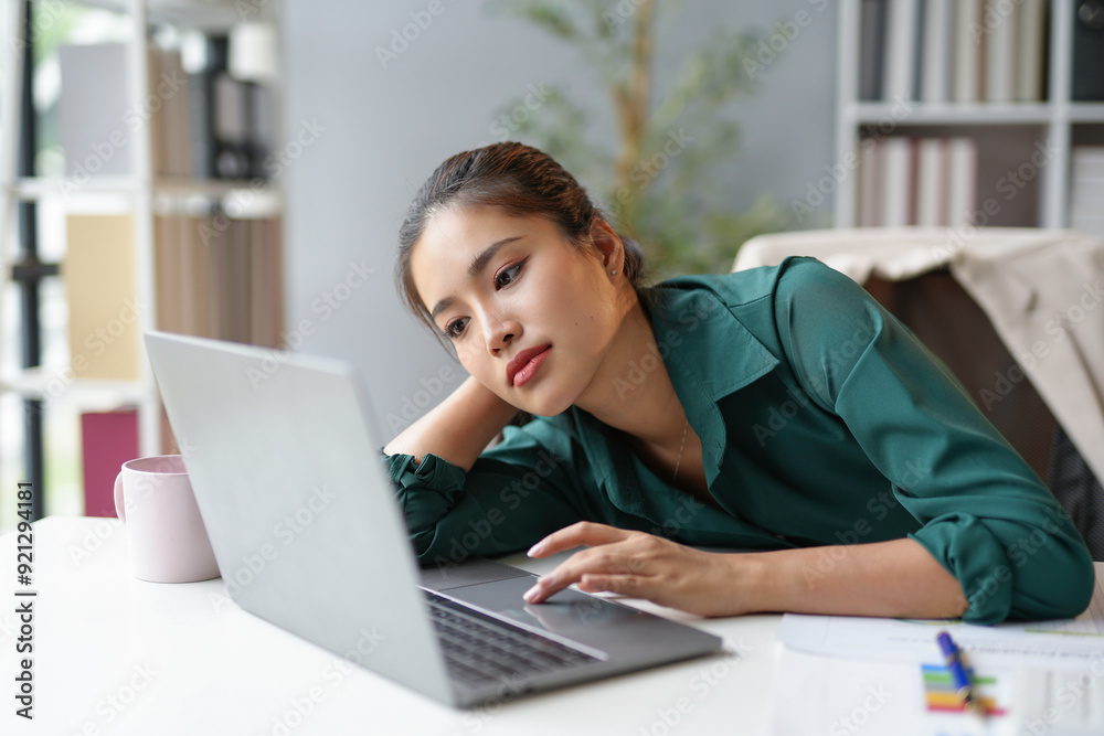 Stressed asian businesswoman in office, tired, overworked, frustrated, feeling pressure, exhaustion, concerned, working on laptop, unhappy Stressed asian businesswoman in office, tired, overworked, frustrated, feeling pressure, exhaustion, concerned, working on laptop, unhappy