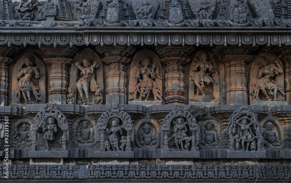 Tiny and intricate carvings, sculptures of the temples of the Hoysala Empire. Belur. India. Tiny and intricate carvings, sculptures of the temples of the Hoysala Empire. Belur. India.