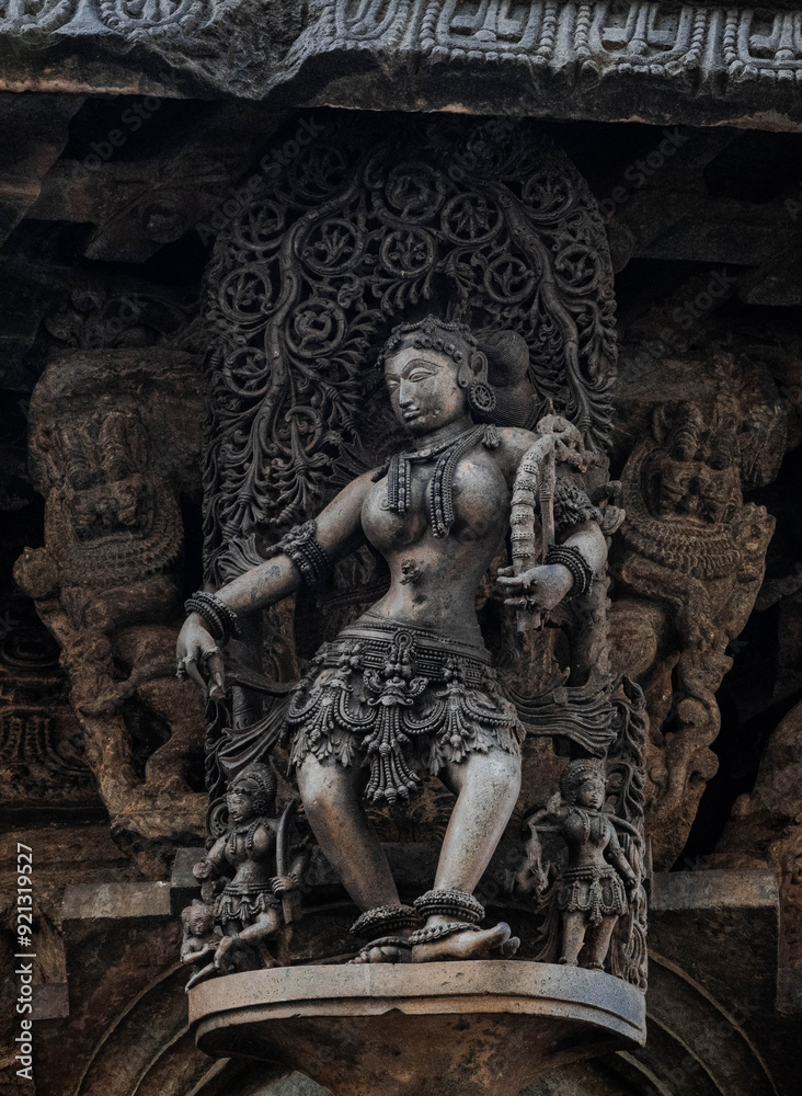 Tiny and intricate carvings, sculptures of the temples of the Hoysala Empire. Belur. India. Tiny and intricate carvings, sculptures of the temples of the Hoysala Empire. Belur. India.