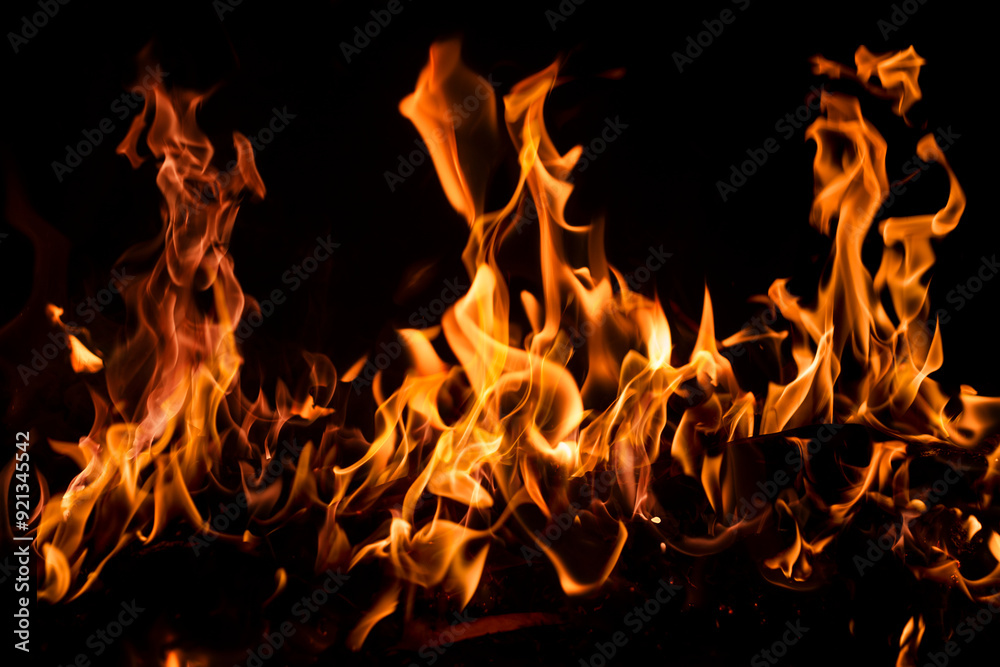 Blaze fire flame texture background. Fire sparks background. Abstract fire flame texture for banner background. Flaming burning effect. Abstract art pattern with copy space.