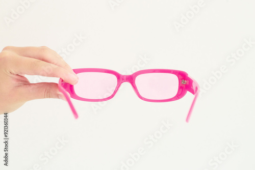 pink sunglasses on white background