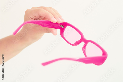 pink sunglasses on white background