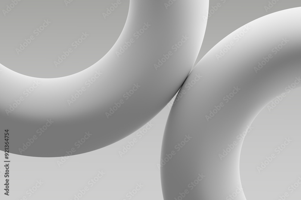 Abstract view of two interlocking white shapes on a light background