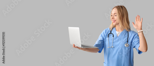 Beautiful female doctor wit...