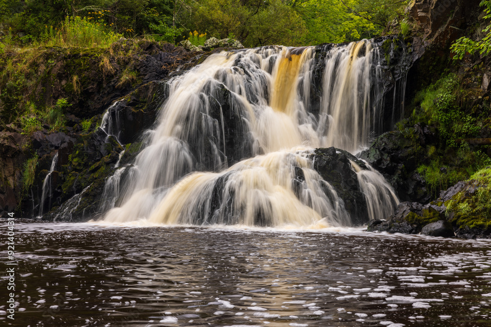 Fototapeta premium Interstate Falls - A scenic waterfall landscape on the border of Wisconsin and Michigan.