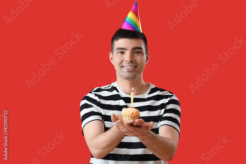 Happy young man with birthd...