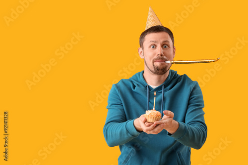 Funny man with birthday cak...
