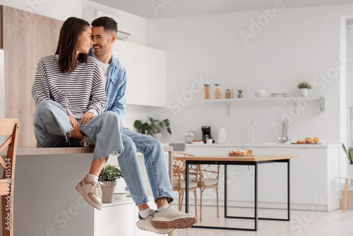 Happy young couple at home