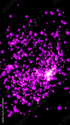 Colorful particle animation with bright pink dots on a dark background