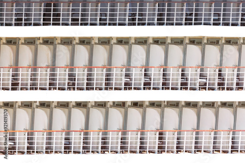 Obraz na płótnie Row of cabins balcony arranged neatly on a ship, showcasing a cruise vacation w salonie