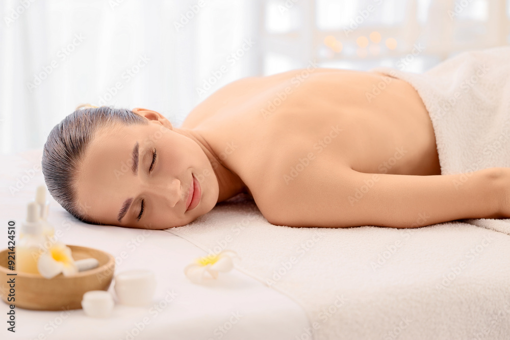 Young woman resting after massage in spa salon Young woman resting after massage in spa salon