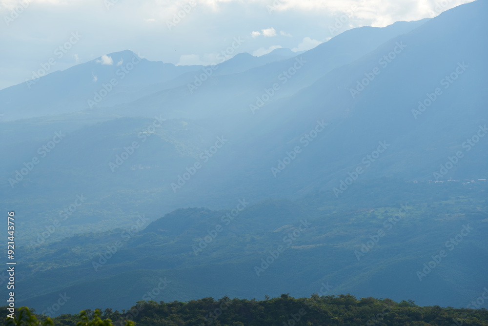 Fototapeta premium Colombian Andean landscape, Layers of mountains that extend, covered with vegetation, to the horizon.