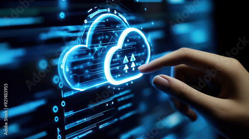 Hand touching digital cloud icon on screen,