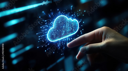 Hand touching digital cloud icon on screen,