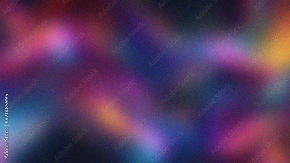 Obraz premium A vibrant background with a smooth gradient of bold colors, overlaid with subtle noise texture. The mix of vivid hues and soft grain adds depth and energy, making it visually striking and modern.