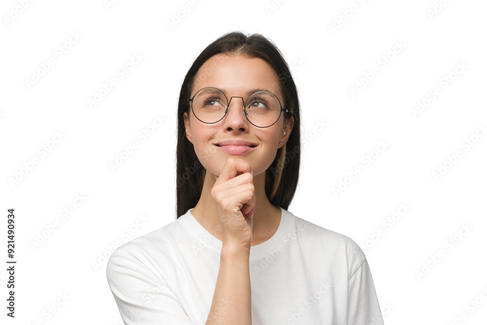 Portrait of young woman with dreamy cheerful expression, thinking or dreaming, wearing glasses Portrait of young woman with dreamy cheerful expression, thinking or dreaming, wearing glasses