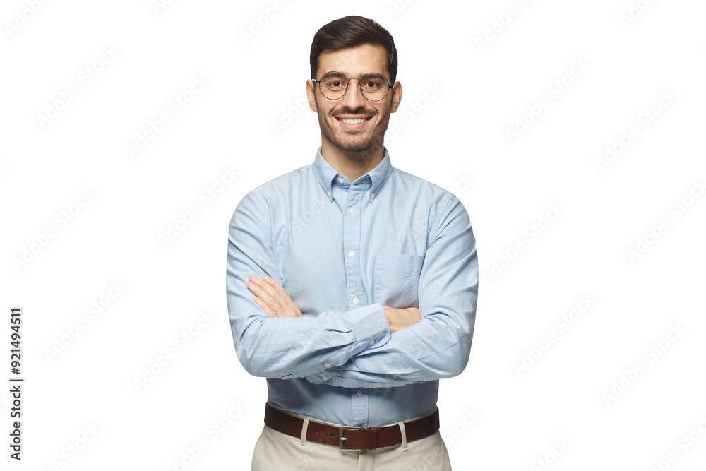 Successful young businessman standing with crossed arms Successful young businessman standing with crossed arms