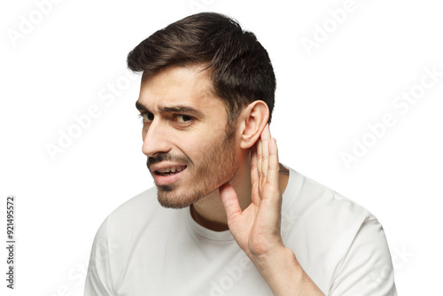 Принти на полотні Young man pressing hand to ear trying to hear something better