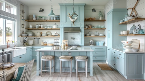 Nautical-themed kitchen featuring light blue cabinets, white island, open shelving, and coastal-inspired decorations