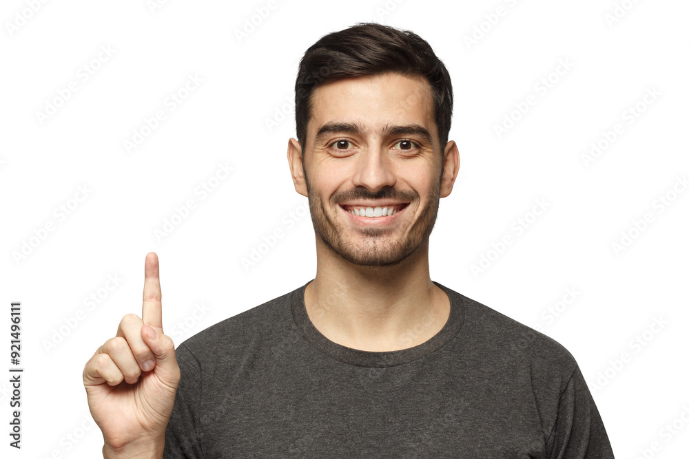 Handsome young man pointing up with his finger Handsome young man pointing up with his finger