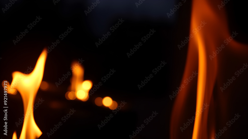 Bright flames rising and moving at dark nigh in blurred background. Generative AI Bright flames rising and moving at dark nigh in blurred background. Generative AI