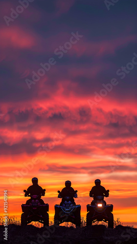 Dramatic Quadbike Silhouettes Against a Stunning Sunset: A Visual Celebration of Adventure and Thrill