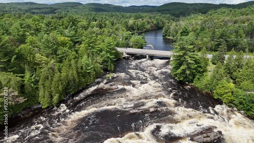 Drone flight above cascades and waterfalls park on the Ouareau River, in Rawdon, Quebec, Canada photo