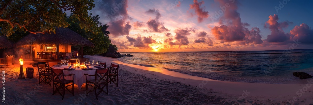A tropical dinner on a private island, with a table set on the sand, surrounded by tiki torches, soft ocean breezes, and a stunning sunset creating a paradise-like atmosphere A tropical dinner on a private island, with a table set on the sand, surrounded by tiki torches, soft ocean breezes, and a stunning sunset creating a paradise-like atmosphere