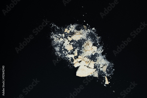 Clear Image of a pile of white powder on black background