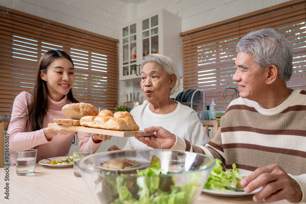 Asian lovely family having dinner enjoy eating party in house together. 