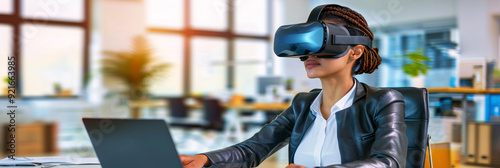 A professional black woman wearing a VR headset explores virtual reality in an office setting. She is immersed in a digital experience, highlighting the modern and innovative technology. photo