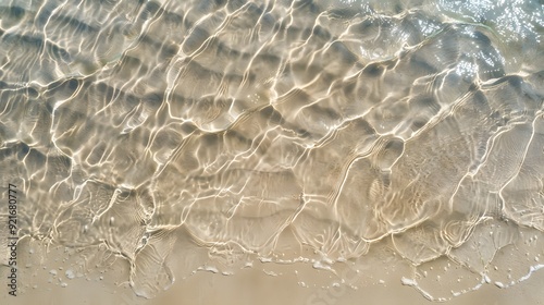 Aerial perspective of smooth, clean beach sand with subtle natural patterns photo