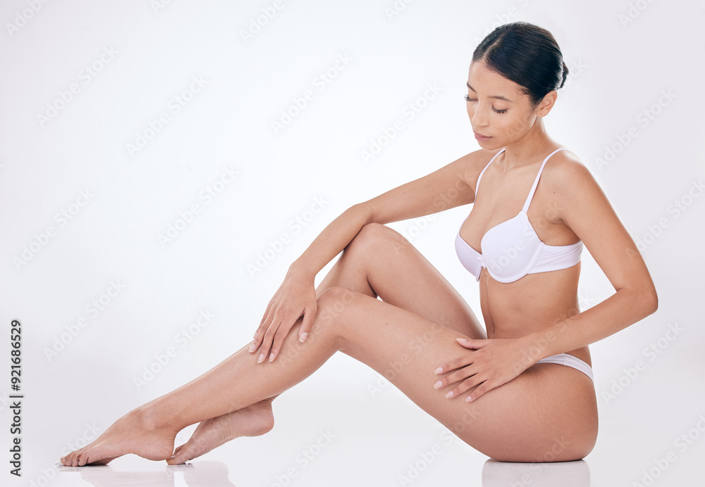 Woman, underwear and legs in studio for hygiene, laser and hair removal with model aesthetic. Girl, touch and natural beauty with epilation or waxing for shaving transformation on white background Woman, underwear and legs in studio for hygiene, laser and hair removal with model aesthetic. Girl, touch and natural beauty with epilation or waxing for shaving transformation on white background