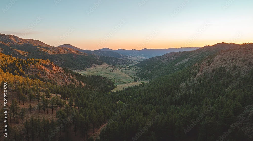 Overhead shot of a mountain valley at sunrise, with clear sky for copy Overhead shot of a mountain valley at sunrise, with clear sky for copy