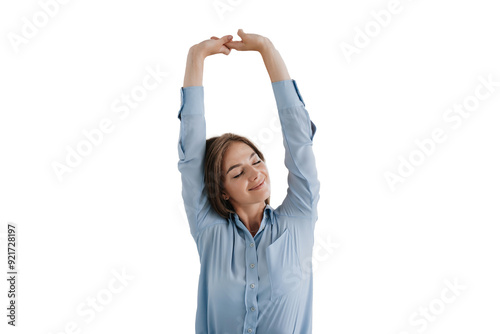 young woman in a blue shirt stretches with closed eyes, enjoying a moment of relaxation, demonstrating mindfulness and well-being against transparent background photo